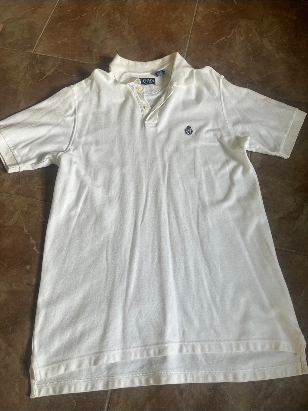 Chaps Men’s White Polo with Subtle Crest Embroidery